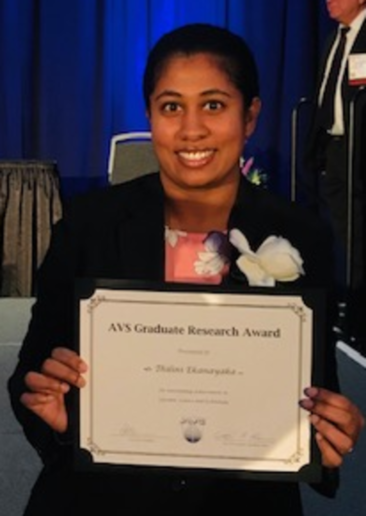 Picture of Thilini Ekanayaka holding a student award